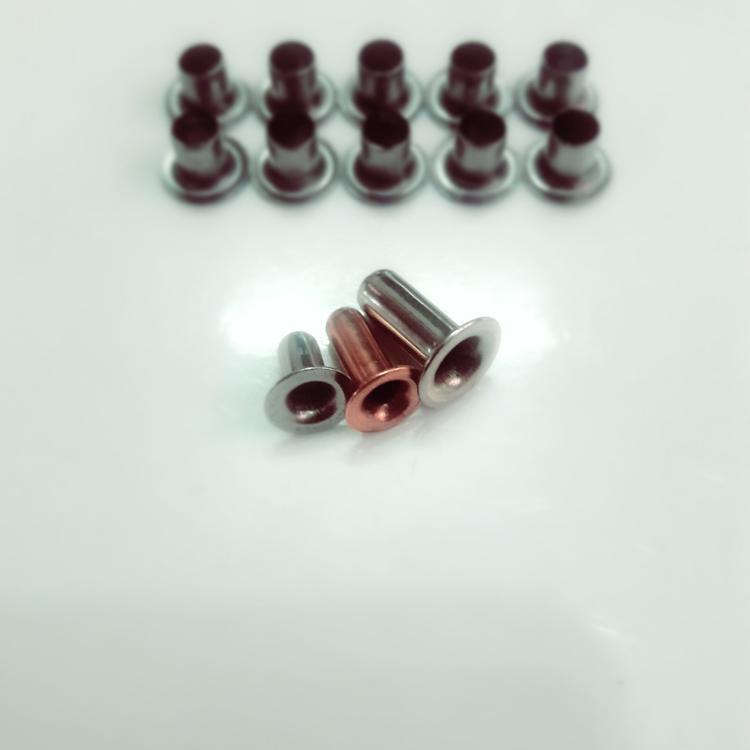 Eyelets/rivets